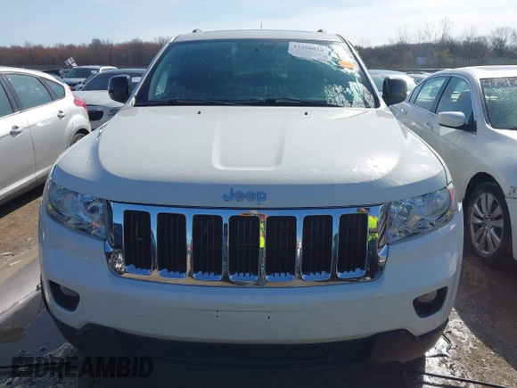2012 Jeep Grand Cherokee Laredo with VIN 1C4RJFAG6CC279427, listed as a IAAI auction lot 41956034 with 86,689 mi miles. Bid and sale history available at carsss.com. Image 12.