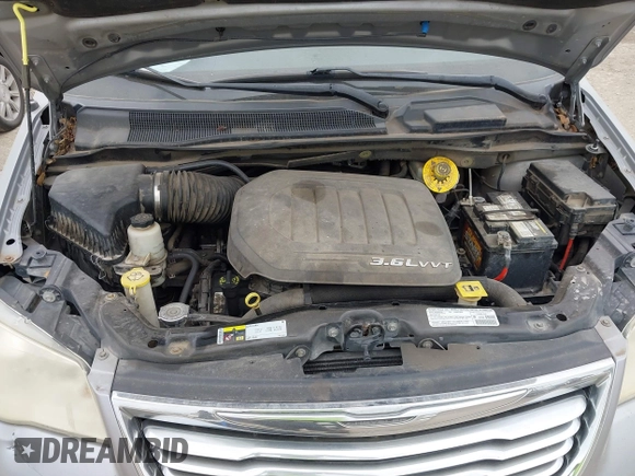 2013 Chrysler Town & Country Touring L with VIN 2C4RC1CG7DR779762, listed as a IAAI auction lot 42118866 with 151,833 mi miles and . Bid and sale history available at DreamBid. Image 10.