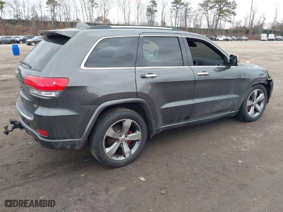 2014 Jeep Grand Cherokee Overland with VIN 1C4RJFCGXEC172008, listed as a IAAI auction lot 41719313 with 164,682 mi miles. Bid and sale history available at carsss.com. Image 4.