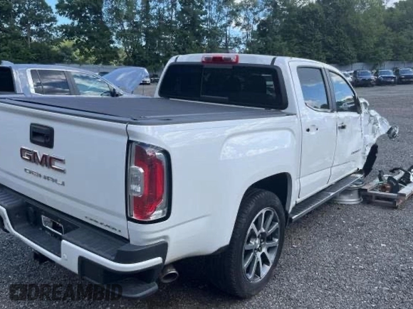 2022 GMC Canyon 2WD Denali with VIN 1GTG5EEN5N1119522, listed as a Copart auction lot 74137424 with 30,820 mi miles and Salvage Title. Bid and sale history available at carsss.com. Image 4.