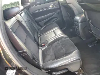2012 Jeep Grand Cherokee SRT8 with VIN 1C4RJFDJ9CC346867, listed as a Copart auction lot 86349154 with 125,130 mi miles and Salvage Title. Bid and sale history available at carsss.com. Image 11.
