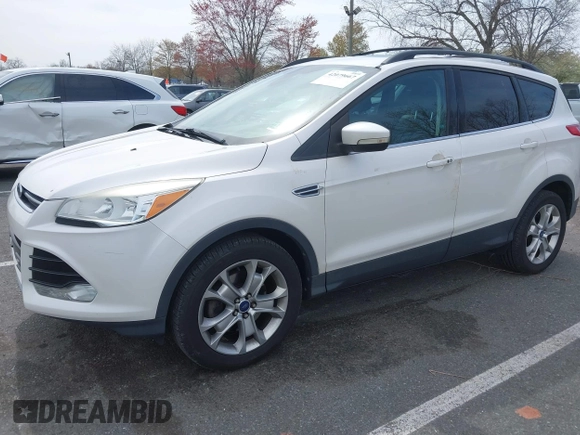 2013 Ford Escape SEL with VIN 1FMCU9HXXDUD82944, listed as a IAAI auction lot 42079667 with 97,304 mi miles. Bid and sale history available at carsss.com. Image 2.