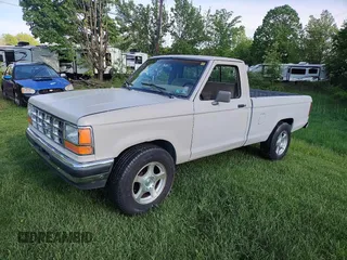 1990 Ford Ranger with VIN 1FTCR10T5LUB33370, listed as a Copart auction lot 56433285 with 110,895 mi miles and Clean title. Bid and sale history available at DreamBid. Image 2.