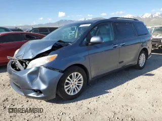 2014 Toyota Sienna XLE with VIN 5TDYK3DC5ES467244, listed as a Copart auction lot 54777445 with 157,503 mi miles and Salvage Title. Bid and sale history available at DreamBid. Image 1.