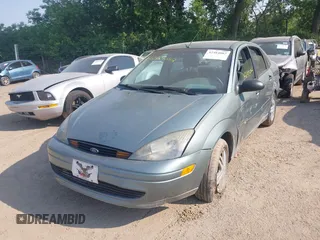 2003 Ford Focus SE with VIN 1FAFP34P33W252024, listed as a IAAI auction lot 42484082 with 125,777 mi miles and . Bid and sale history available at DreamBid. Image 2.