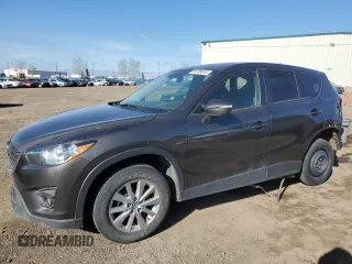 2016 Mazda CX-5 Touring z VIN JM3KE4CY6G0813914, wystawiony jako Copart lot #54786915 z przebiegiem 155 952 mil mil oraz Szkoda całkowita • Salvage title. Historia ofert i sprzedaży dostępna na DreamBid. Obrazek 1.