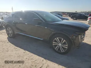 2024 Cadillac LYRIQ Luxury z VIN 1GYKPPRK1RZ137520, wystawiony jako Copart lot #50578095 z przebiegiem 6815 mil mil oraz Szkody całkowita. Historia ofert i sprzedaży dostępna na DreamBid. Obrazek 4.