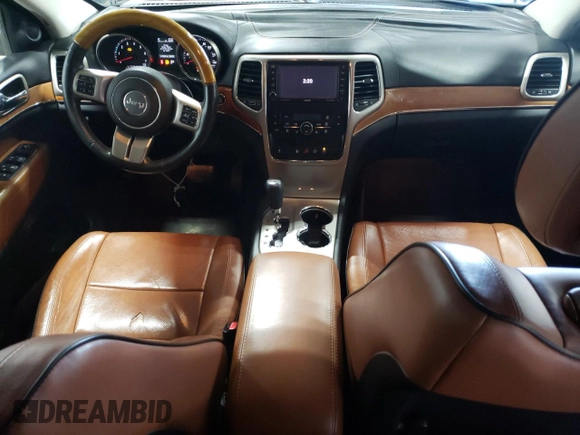 2013 Jeep Grand Cherokee Overland with VIN 1C4RJFCG7DC646348, listed as a Copart auction lot 49526415 with 137,889 mi miles and Clean Title. Bid and sale history available at carsss.com. Image 8.
