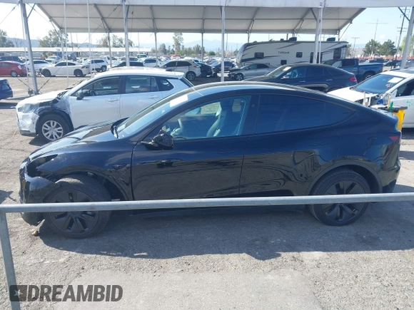 2025 Tesla Model Y Long Range with VIN 7SAYGDEE9SF278607, listed as a IAAI auction lot 41932084 with 9,667 mi miles and . Bid and sale history available at carsss.com. Image 15.