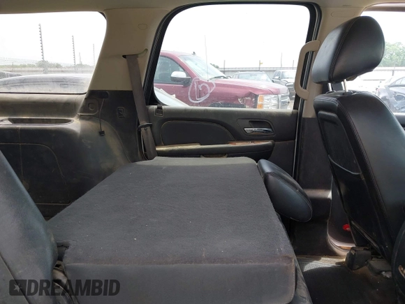 2012 Chevrolet Tahoe LTZ with VIN 1GNSCCE00CR197950, listed as a IAAI auction lot 42393693 with 296,161 mi miles and . Bid and sale history available at DreamBid. Image 8.