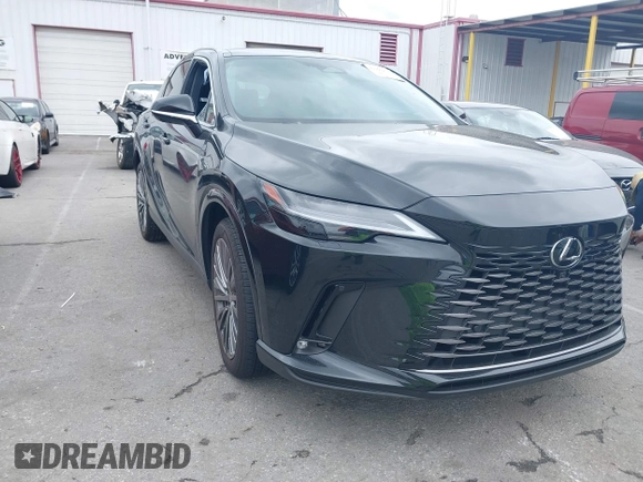 2024 Lexus RX 450h+ Luxury with VIN JTJCJMGA1R2022295, listed as a IAAI auction lot 41778650 with 1,822 mi miles and . Bid and sale history available at DreamBid. Image 1.