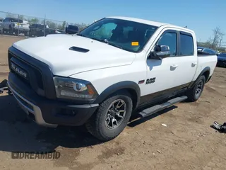 2018 Ram 1500 Rebel with VIN 1C6RR7YT3JS133384, listed as a IAAI auction lot 42097247 with 77,621 mi miles and . Bid and sale history available at DreamBid. Image 2.