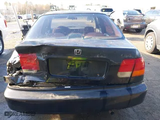 1997 Honda Civic EX with VIN 2HGEJ8645VH566736, listed as a IAAI auction lot 41876647 with 277,968 mi miles. Bid and sale history available at carsss.com. Image 16.