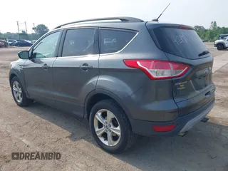 2016 Ford Escape SE z VIN 1FMCU0GX1GUC56439, wystawiony jako IAAI lot #42491397 z przebiegiem 158 785 mil mil oraz . Historia ofert i sprzedaży dostępna na DreamBid. Obrazek 3.
