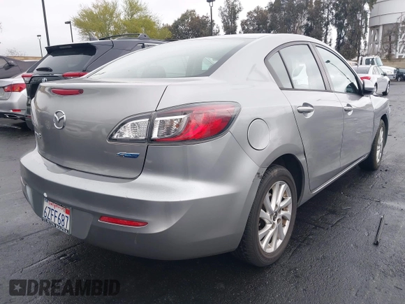 2013 Mazda 3 i Touring z VIN JM1BL1VP9D1776008, wystawiony jako IAAI lot #42185317 z przebiegiem 174 085 mil mil oraz . Historia ofert i sprzedaży dostępna na DreamBid. Obrazek 4.