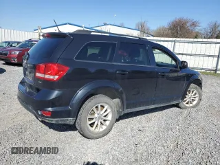 2013 Dodge Journey SXT with VIN 3C4PDDBG3DT572872, listed as a Copart auction lot 54147785 with 147,959 mi miles and Salvage Title. Bid and sale history available at DreamBid. Image 3.