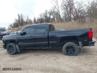 2018 Chevrolet Silverado 1500 LT with VIN 1GCVKREC7JZ165550, listed as a IAAI auction lot 41854559 with 77,647 mi miles. Bid and sale history available at carsss.com. Image 13.