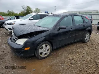 2007 Ford Focus S z VIN 1FAHP37N37W275991, wystawiony jako Copart lot #57595095 z przebiegiem 149 188 mil mil oraz Szkoda całkowita • Salvage title. Historia ofert i sprzedaży dostępna na DreamBid. Obrazek 1.