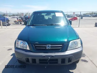 2000 Honda CR-V LX z VIN JHLRD2849YC011915, wystawiony jako IAAI lot #42040519 z przebiegiem 160 919 mil mil oraz . Historia ofert i sprzedaży dostępna na DreamBid. Obrazek 12.