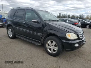 2005 Mercedes-Benz M 350 with VIN 4JGAB57E95A556723, listed as a Copart auction lot 52584115 with 232,283 mi miles and Salvage title. Bid and sale history available at DreamBid. Image 4.