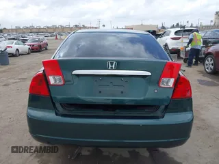 2001 Honda Civic LX with VIN JHMES16571S002955, listed as a IAAI auction lot 42128296 with 223,009 mi miles and . Bid and sale history available at DreamBid. Image 17.