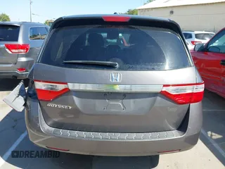 2012 Honda Odyssey EX-L with VIN 5FNRL5H65CB012428, listed as a IAAI auction lot 42164272 with 256,253 mi miles and . Bid and sale history available at carsss.com. Image 16.