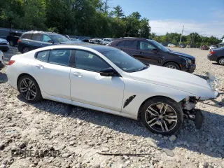 2023 BMW 8 Series M850i with VIN WBAGV8C01PCM79724, listed as a Copart auction lot 69486194 with 14,285 mi miles and Salvage title. Bid and sale history available at DreamBid. Image 4.
