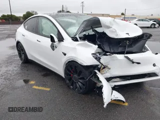 2022 Tesla Model Y Performance with VIN 7SAYGDEFXNF384268, listed as a IAAI auction lot 41558359 with 33,870 mi miles and . Bid and sale history available at DreamBid. Image 1.