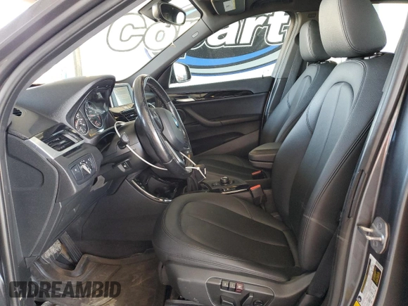 2016 BMW X1 xDrive28i with VIN WBXHT3Z38G4A49061, listed as a Copart auction lot 54010455 with 120,875 mi miles and Salvage Title. Bid and sale history available at DreamBid. Image 7.