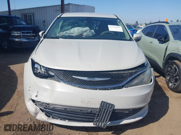 2017 Chrysler Pacifica Touring with VIN 2C4RC1DG6HR633826, listed as a IAAI auction lot 42170041 with 143,481 mi miles and . Bid and sale history available at DreamBid. Image 12.