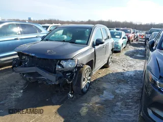 2017 Jeep Compass Latitude with VIN 1C4NJDEB0HD190200, listed as a IAAI auction lot 41733462 with 77,374 mi miles and . Bid and sale history available at DreamBid. Image 2.