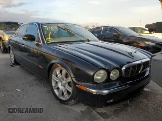 2004 Jaguar XJ with VIN SAJWA71C04SG31354, listed as a Copart auction lot 73742404 with 0 mi miles and Non Repairable. Bid and sale history available at carsss.com. Image 4.