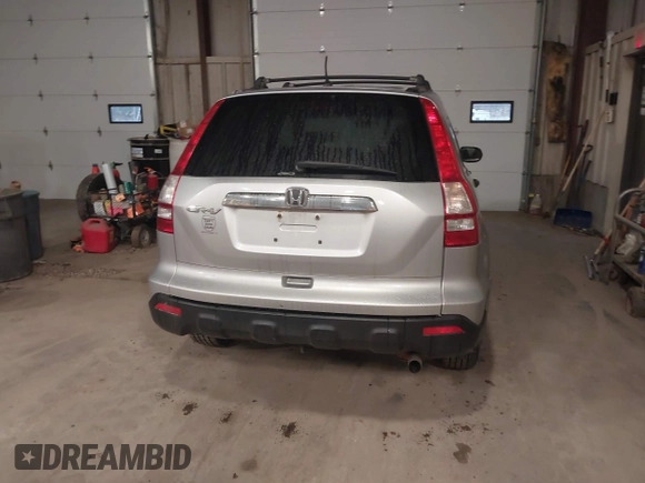 2009 Honda CR-V EX with VIN 5J6RE48539L021091, listed as a IAAI auction lot 41827560 with 106,479 mi miles. Bid and sale history available at carsss.com. Image 16.