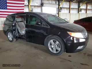 2012 Honda Odyssey Touring with VIN 5FNRL5H94CB026539, listed as a Copart auction lot 48925605 with 88,381 mi miles and Salvage Title. Bid and sale history available at carsss.com. Image 4.