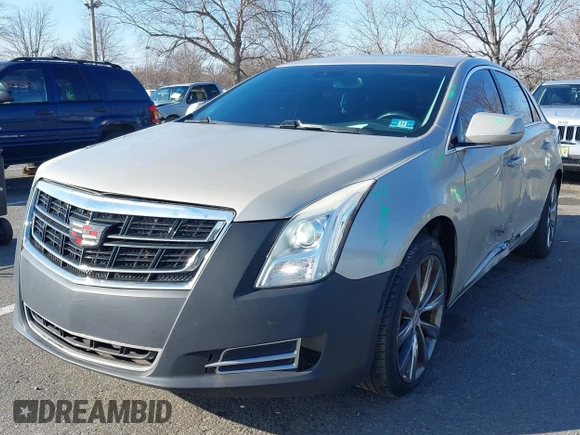 2013 Cadillac XTS Luxury z VIN 2G61R5S31D9185009, wystawiony jako IAAI lot #41243001 z przebiegiem 161 219 mil mil oraz . Historia ofert i sprzedaży dostępna na DreamBid. Obrazek 2.