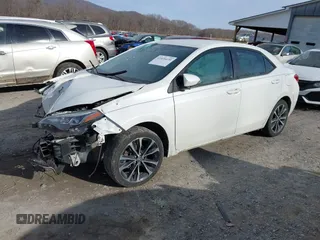 2017 Toyota Corolla L z VIN 5YFBURHE5HP633791, wystawiony jako IAAI lot #41426630 z przebiegiem 99 450 mil mil oraz . Historia ofert i sprzedaży dostępna na DreamBid. Obrazek 18.