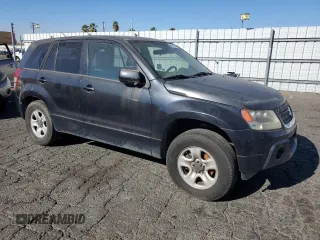 2009 Suzuki Grand Vitara z VIN JS3TD042294100363, wystawiony jako Copart lot #88151185 z przebiegiem 86 595 mil mil oraz Czysty tytuł • Clean title. Historia ofert i sprzedaży dostępna na DreamBid. Obrazek 4.