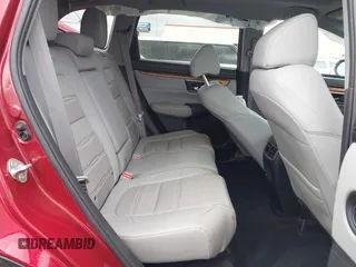 2020 Honda CR-V Touring with VIN 5J6RW2H94LL017434, listed as a IAAI auction lot 41556184 with 97,016 mi miles and . Bid and sale history available at DreamBid. Image 8.