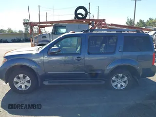 2005 Nissan Pathfinder SE with VIN 5N1AR18U05C741080, listed as a IAAI auction lot 40671277 with 215,693 mi miles. Bid and sale history available at carsss.com. Image 14.