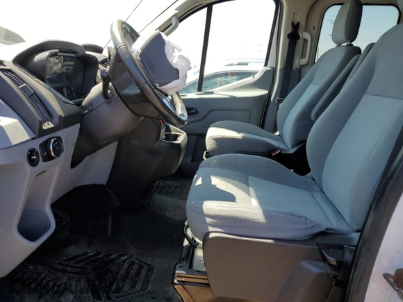 2015 Ford Transit Cargo z VIN 1FTNE1ZM4FKA87207, wystawiony jako Copart lot #58417895 z przebiegiem 184 537 mil mil oraz Nie do naprawy • Non repairable. Historia ofert i sprzedaży dostępna na DreamBid. Obrazek 7.
