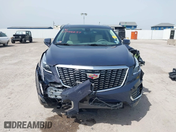 2024 Cadillac XT5 FWD Premium Luxury with VIN 1GYKNCR41RZ738779, listed as a IAAI auction lot 42266837 with 3,166 mi miles and . Bid and sale history available at DreamBid. Image 13.