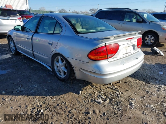 2004 Oldsmobile Alero GL1 z VIN 1G3NL52E94C189058, wystawiony jako IAAI lot #41224615 z przebiegiem 208 921 mil mil oraz . Historia ofert i sprzedaży dostępna na DreamBid. Obrazek 3.
