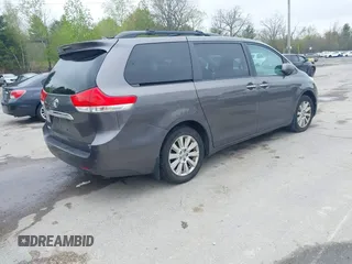 2012 Toyota Sienna XLE with VIN 5TDDK3DC2CS043855, listed as a IAAI auction lot 42189680 with 195,788 mi miles and . Bid and sale history available at DreamBid. Image 4.
