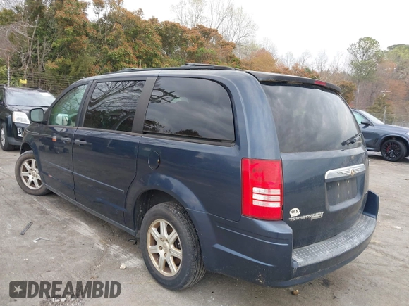 2008 Chrysler Town & Country LX with VIN 2A8HR44H28R114978, listed as a IAAI auction lot 41860775 with 179,828 mi miles. Bid and sale history available at carsss.com. Image 3.