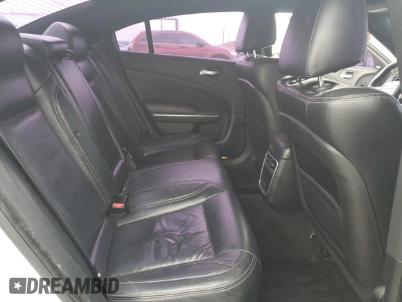 2015 Dodge Charger SXT z VIN 2C3CDXHG7FH721601, wystawiony jako Copart lot #58253925 z przebiegiem 123 004 mil mil oraz Szkoda całkowita • Salvage title. Historia ofert i sprzedaży dostępna na DreamBid. Obrazek 10.