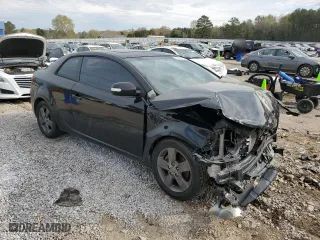2010 Kia Forte Koup EX with VIN KNAFU6A20A5153190, listed as a Copart auction lot 50558145 with 164,077 mi miles and Salvage Title. Bid and sale history available at carsss.com. Image 4.