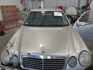 1999 Mercedes-Benz E-Class with VIN WDBJF82HXXX022432, listed as a IAAI auction lot 41793493 with 1 mi miles. Bid and sale history available at carsss.com. Image 10.