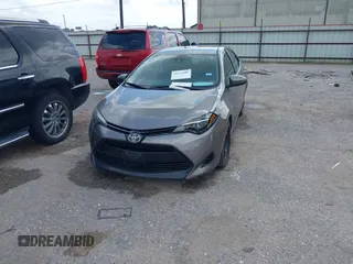2018 Toyota Corolla L z VIN 5YFBURHE1JP855556, wystawiony jako IAAI lot #42273685 z przebiegiem 165 792 mil mil oraz . Historia ofert i sprzedaży dostępna na DreamBid. Obrazek 17.