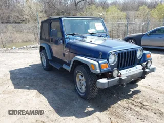 2000 Jeep Wrangler Sport with VIN 1J4FA49S7YP736479, listed as a IAAI auction lot 42042493 with 271,220 mi miles. Bid and sale history available at carsss.com. Image 1.