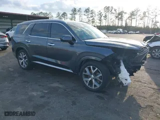 2021 Hyundai Palisade Limited with VIN KM8R54HE2MU257106, listed as a IAAI auction lot 41790977 with 64,777 mi miles. Bid and sale history available at carsss.com. Image 1.